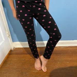 Black leggings with pink glitter cat pattern